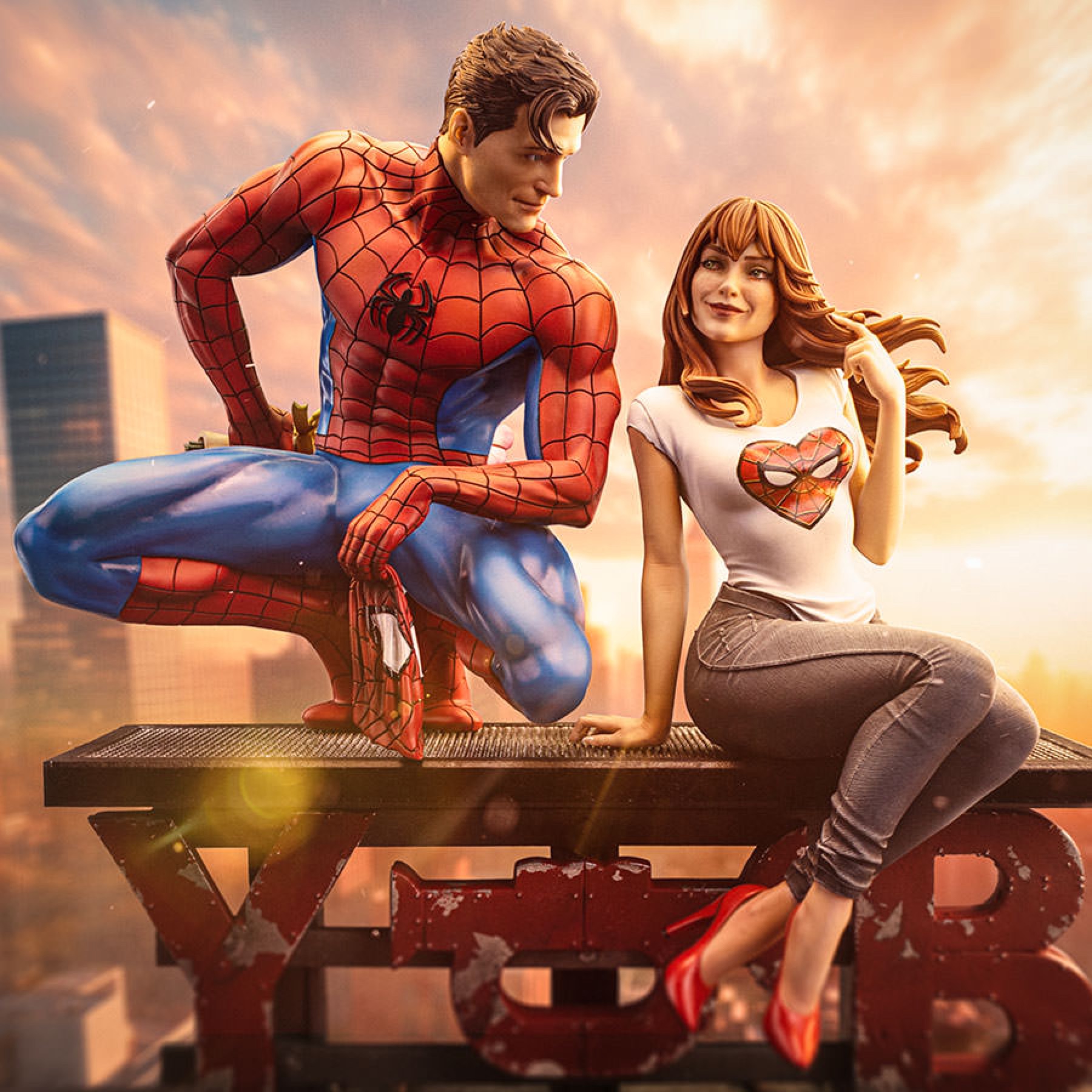 Iron Studios Spider-Man and MJ statue showing both characters seated together above a city skyline